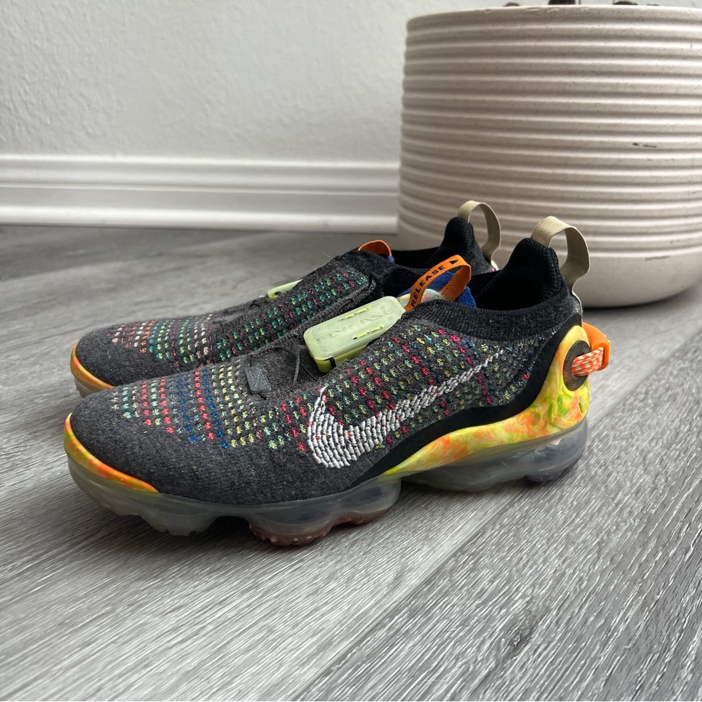 Nike Vapormax sneakers in grey, yellow, and orange